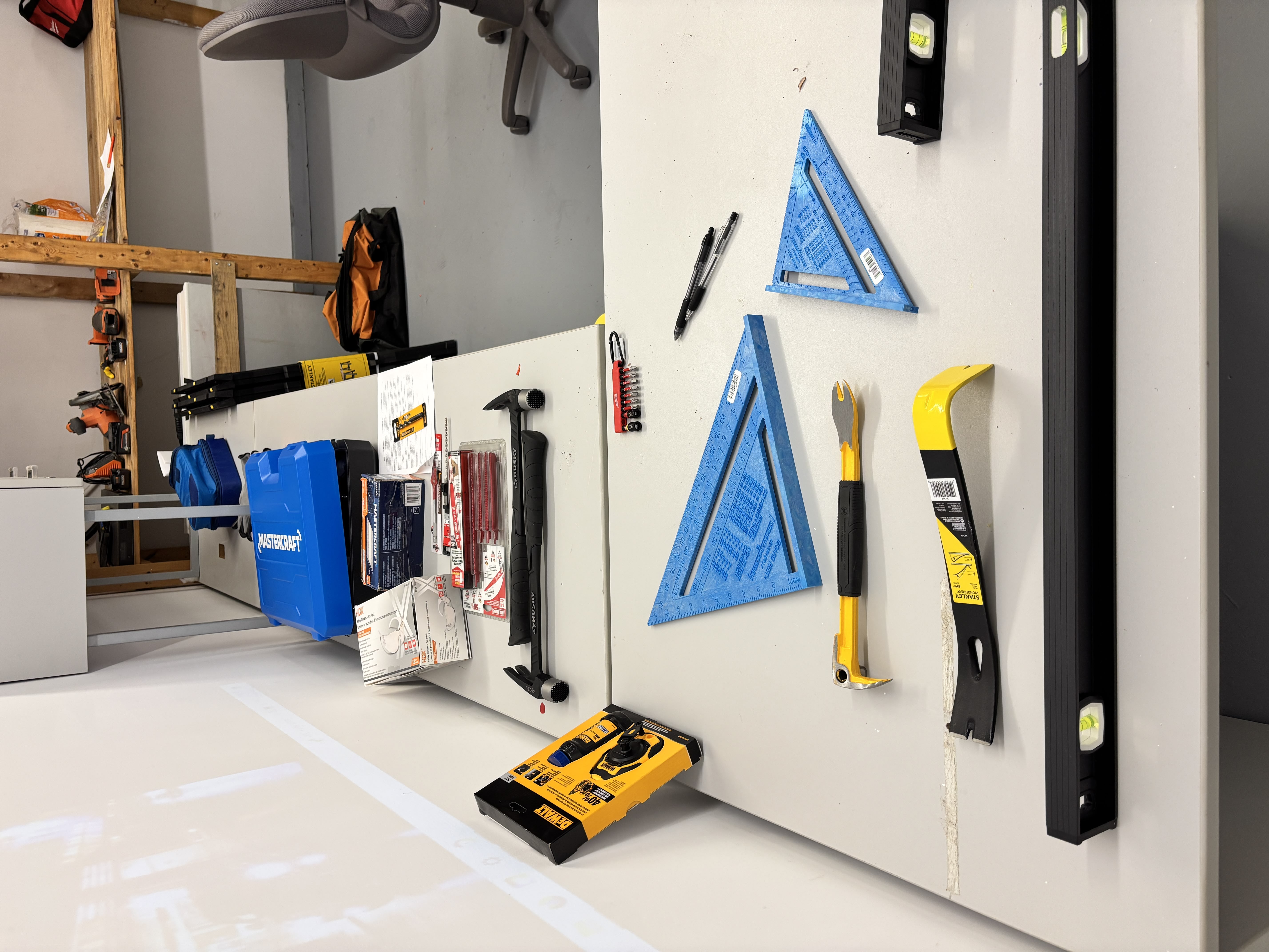 Hand tools and squares on training desk